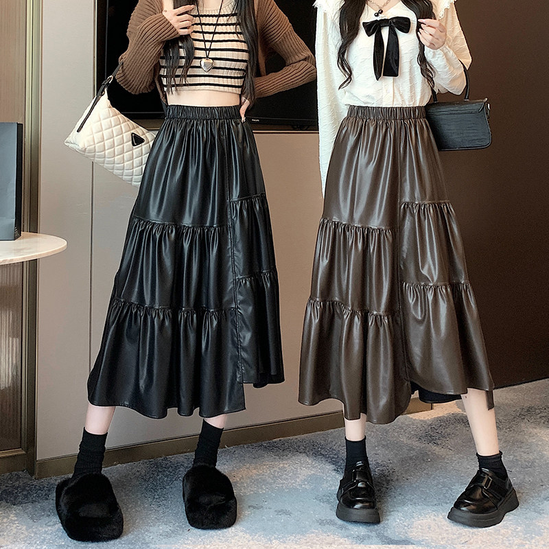 皮裙半身裙女秋冬季2025新款中长款高腰不规则褶皱拼接a字大摆裙