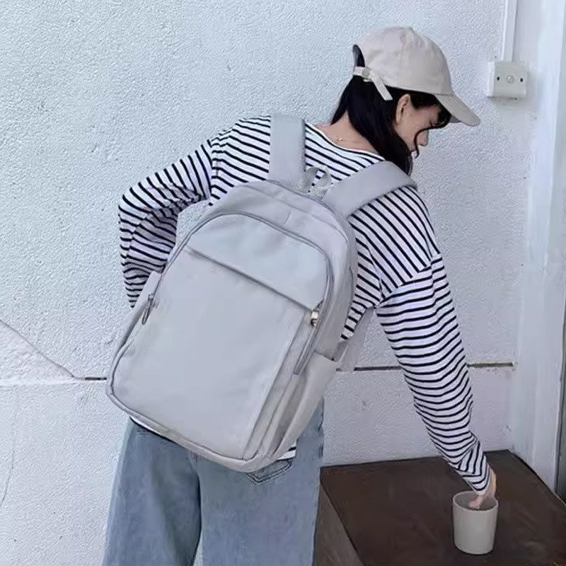 书包女大学生简约小众通勤可放图片
