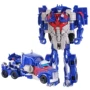 Ngày trẻ em Transformers Auto Man Little Boy Toy Một bước biến dạng Khủng long Xe mô hình Optimus Prime Robot - Đồ chơi gia đình đồ chơi nấu ăn