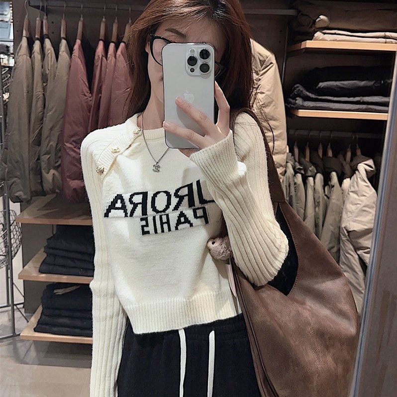 流行毛衣女秋冬小众时髦斜扣设计显瘦长袖针织撞色上衣