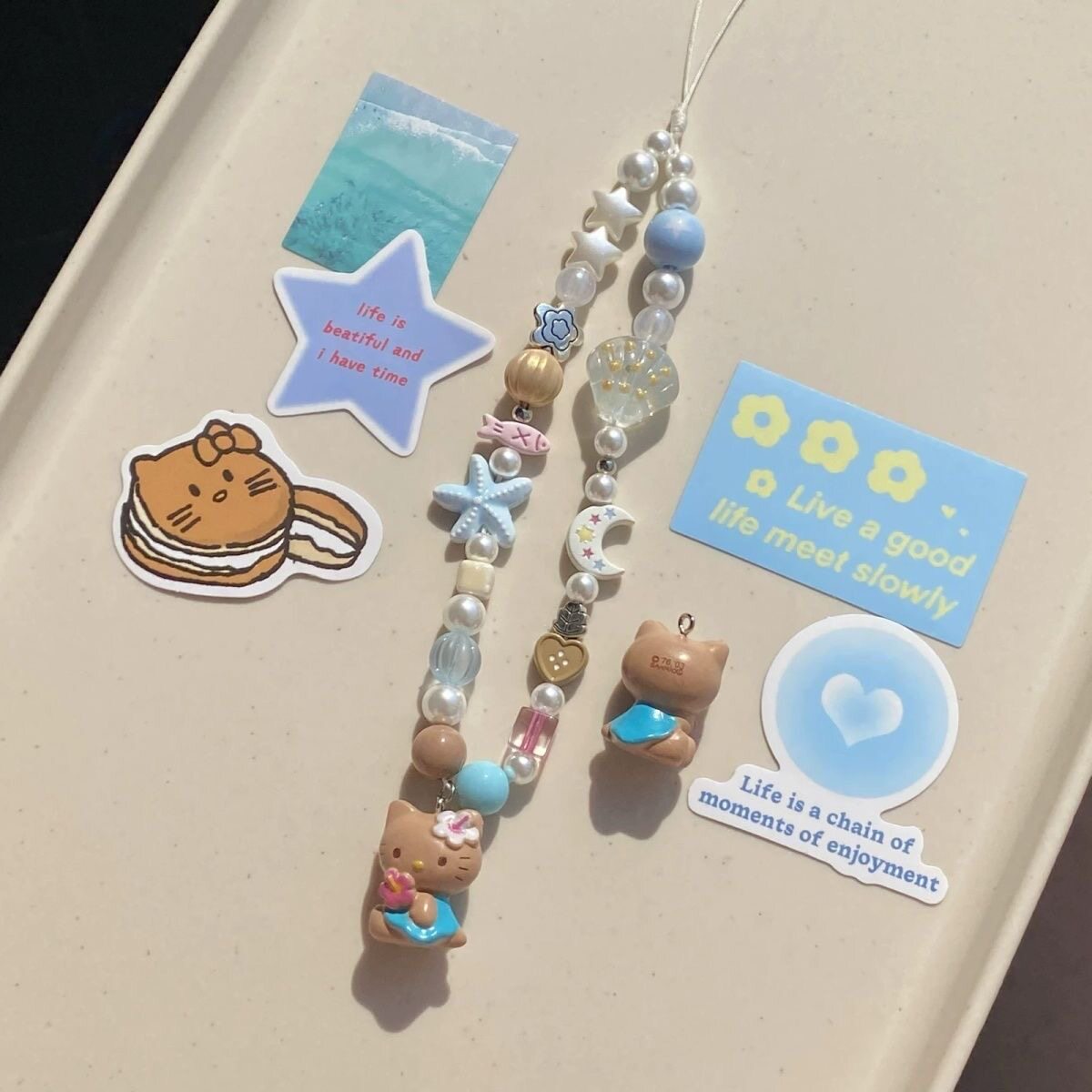 黑皮kt猫海岛度假风小众ins可爱串珠手机链ccd相机挂件挂饰通用女