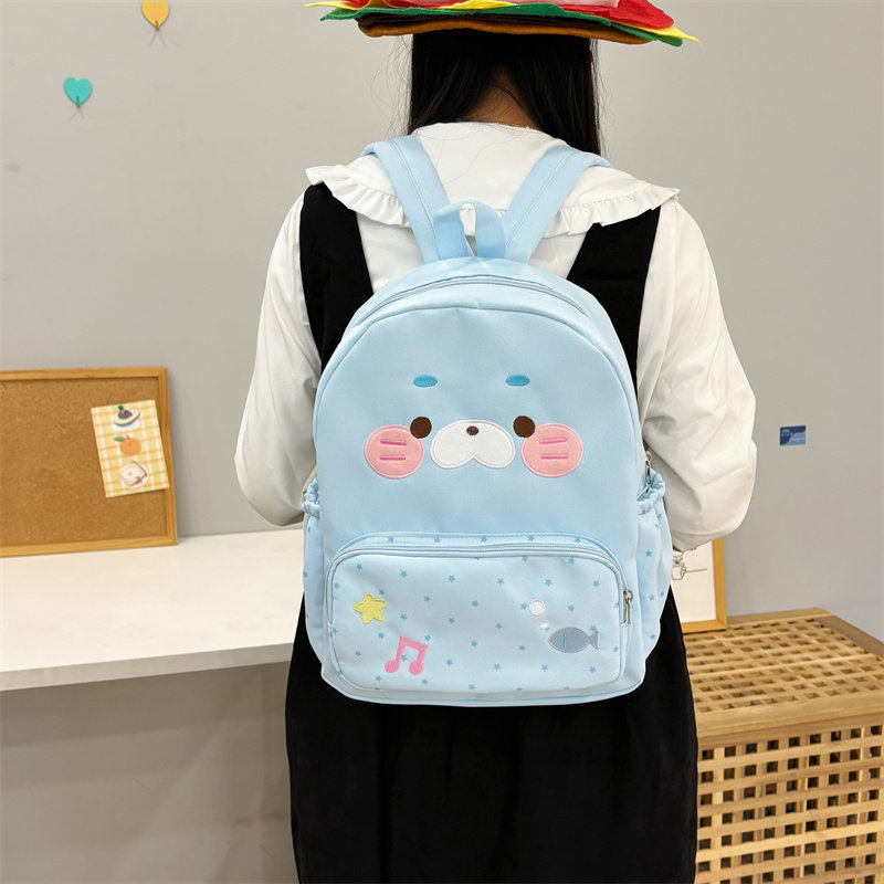 吉吉向上原创正品可爱超萌星星海豹双肩包大容量学生通勤书包