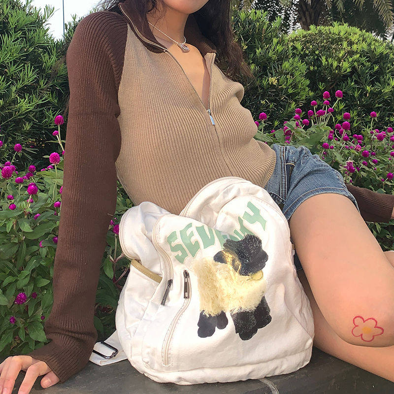 日光欲手作日系动漫学院小羊印花书包休闲百搭甜酷少女帆布双肩包