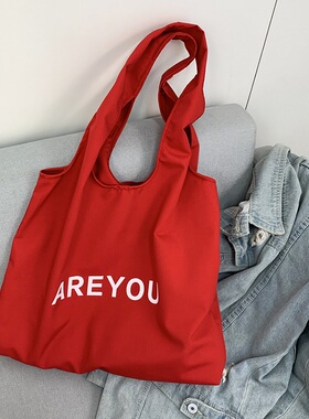 原创中国红色帆布包女2026新款托特包文艺学生布袋休闲通勤单肩包