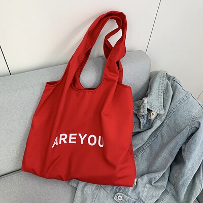 原创中国红色帆布包女2025新款托特包文艺学生布袋休闲通勤单肩包