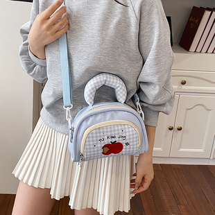 女童高颜值可爱卡通手提格子款洋气斜挎包小女孩便捷出游手机包潮