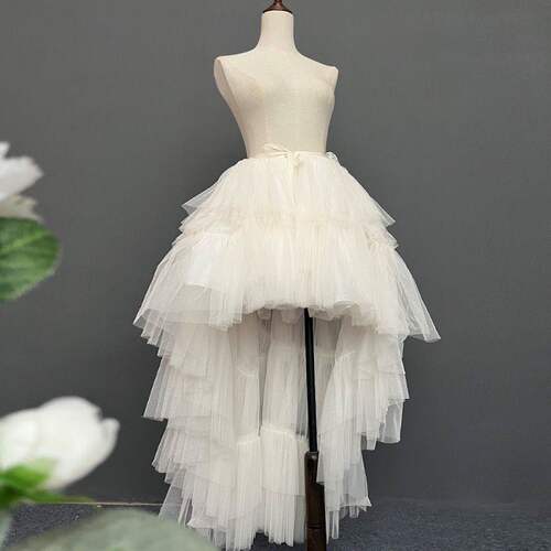 前短后长两穿拖尾一片式