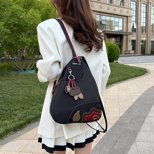 轻便斜挎胸包女士牛津布双肩包潮