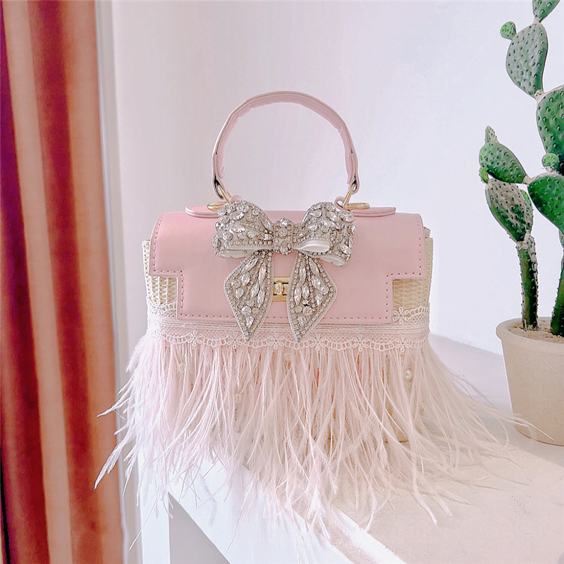 水桶包鸵鸟毛蝴蝶结水钻单肩斜挎