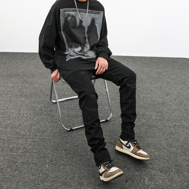 高街破洞补丁黑色小脚牛仔裤男潮