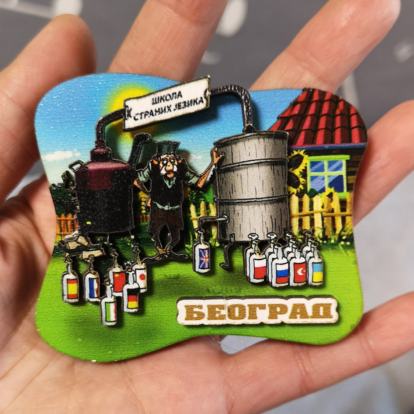 SERBIAN LOCALS BRING BACK BELGRADE FEATURED CARTOON WOODEN FRIDGE MAGNETS