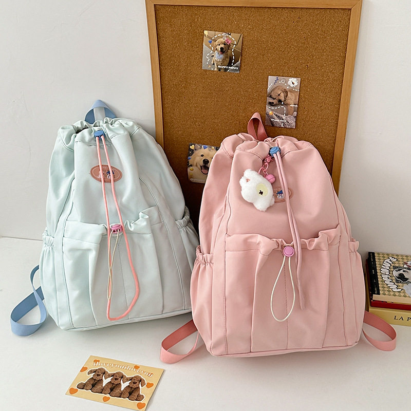 高颜值书包新款少女心抽绳束口通勤旅行背包学生上课百搭双肩包
