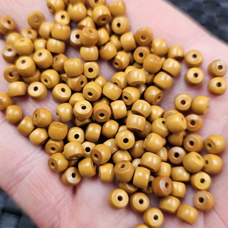橄榄核老型珠散珠黄色木头路路通