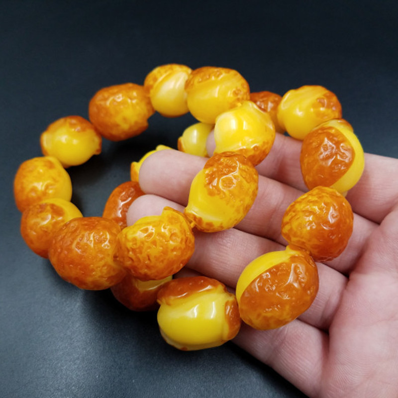 高档精美新款鸡油黄蜜蜡手链人造老蜜蜡带皮手链 蜜蜡随型手串