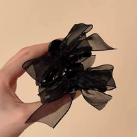 Черная заколка-крабик с бантиком, 1 пары