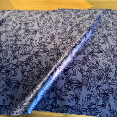 特价植物印花弹力缎刀口料