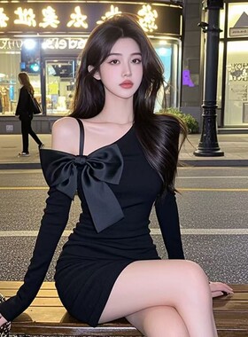 黑色斜肩吊带蝴蝶结长袖连衣裙女秋冬收腰显瘦高冷御姐辣妹短裙子