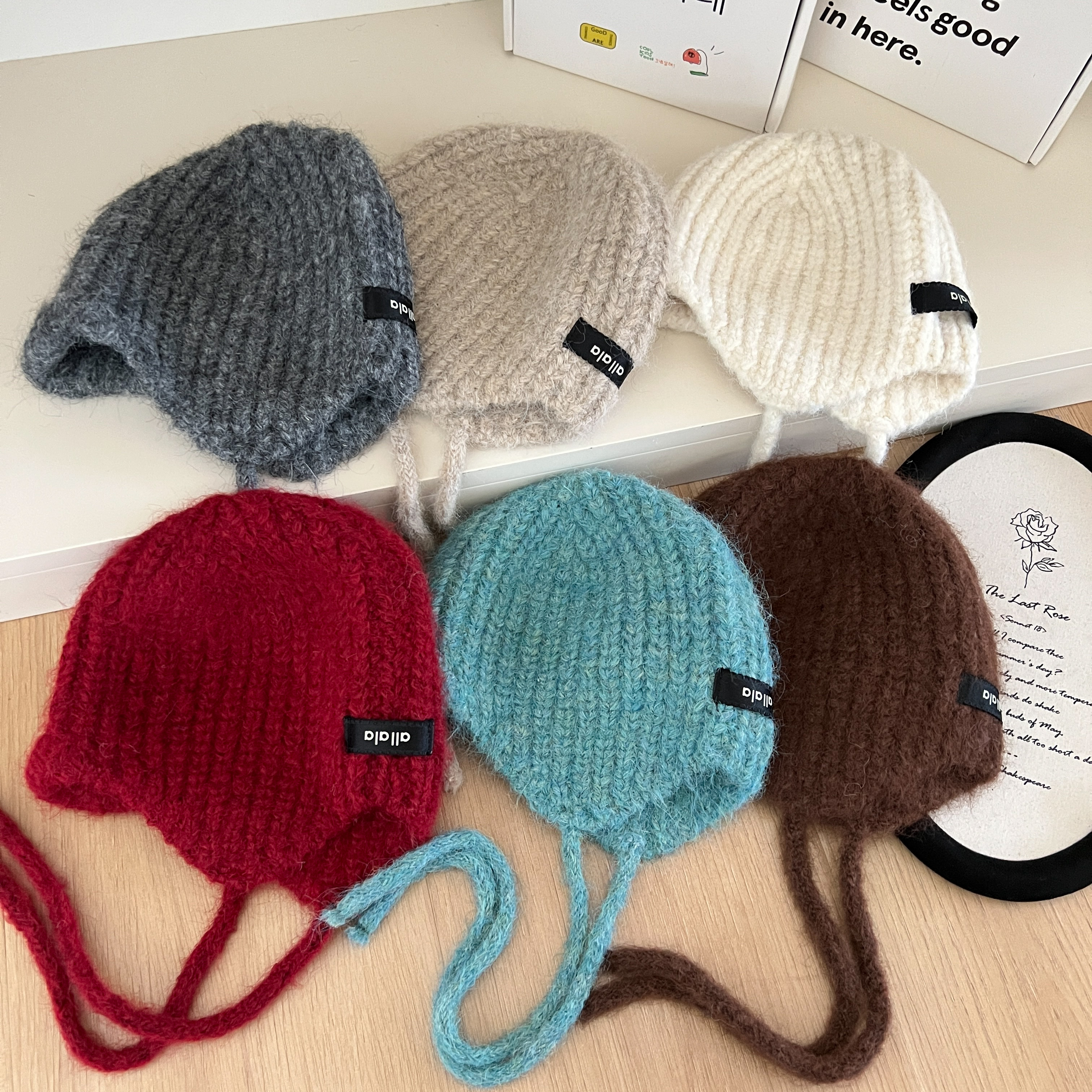 儿童护耳帽纯色洋气小标系带针织帽秋冬季婴幼儿宝宝套头韩版帽子