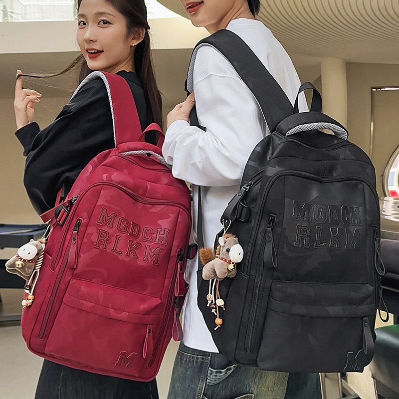 高颜值迷彩风书包女初中生中学生轻便双肩包大学生情侣旅行背包男