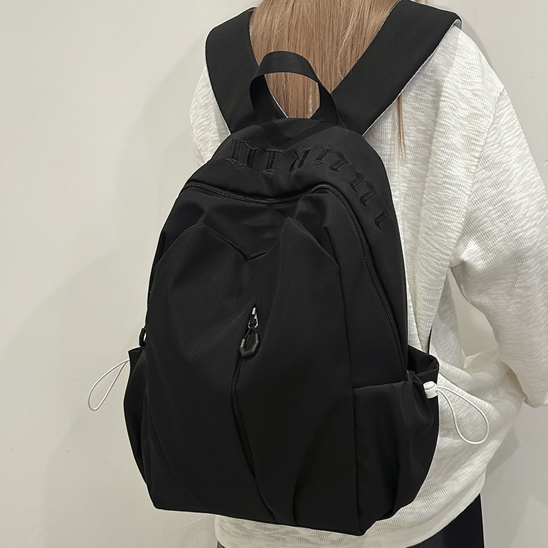 2026新品纯色简约大学生女式通勤双肩背包初中生高中生减负版书包