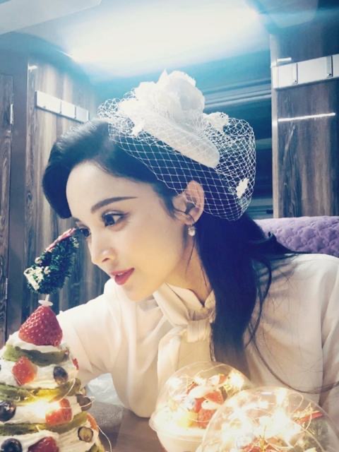 拍照小礼帽花朵女网纱复古四季