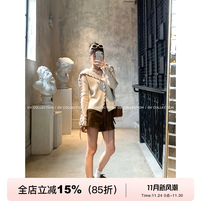 大翻领棒针穿绳麂皮竖条羊毛毛衣