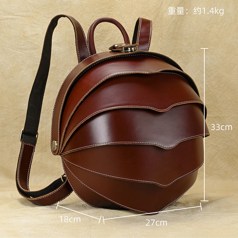 秋冬真皮时尚女背包双肩包个性甲壳虫背包男女通用情侣疯马皮休闲