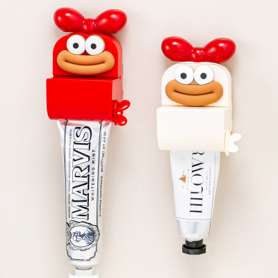 吸盘挤牙膏器家用创意护手霜洗面奶小样手动壁挂儿童牙膏挤压神器