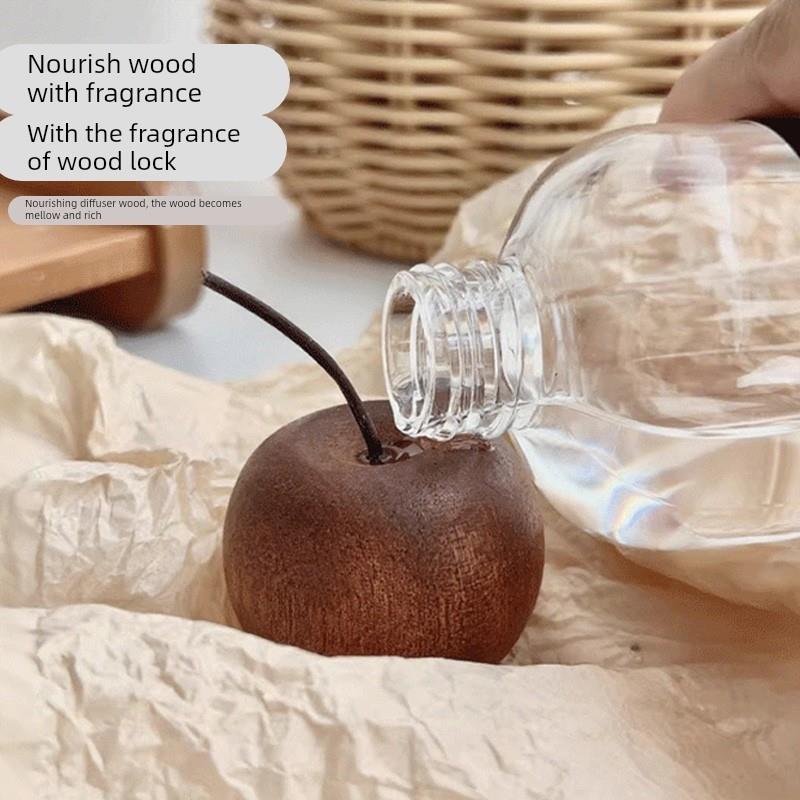 苹果扩香木室内家用持久高级卧室扩香器车载挥发摆件香水香薰精油