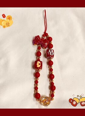 日本PAREO DOLL蝴蝶结红色新年手机链短款手提腕绳挂件防丢挂绳