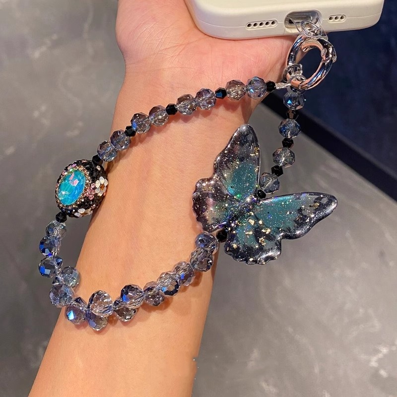 日本PAREO DOLL蓝色水晶串珠蝴蝶手机链爆闪高级感包挂件挂链