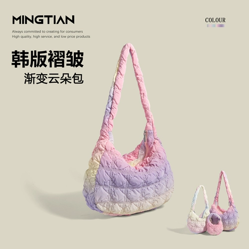 Мингтианский нишевый дизайн чувствует себя поднятой женской сумкой 2024 Новая корейская версия градиентной пузырьковой пузырьковой сумки складываемой облачной булочки