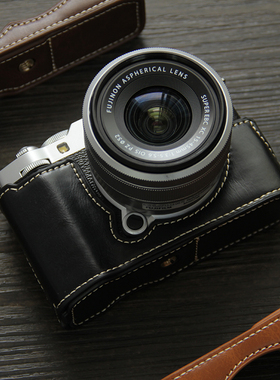 适用富士xm5相机套xhalf底座X20x10皮革xt50/xt5/XT4保护半套X70