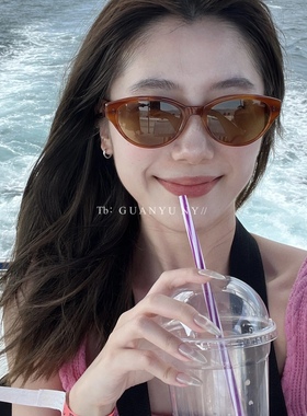 「关於」新款橘色猫眼墨镜小红书同款椭圆形防紫外线黑色太阳眼镜