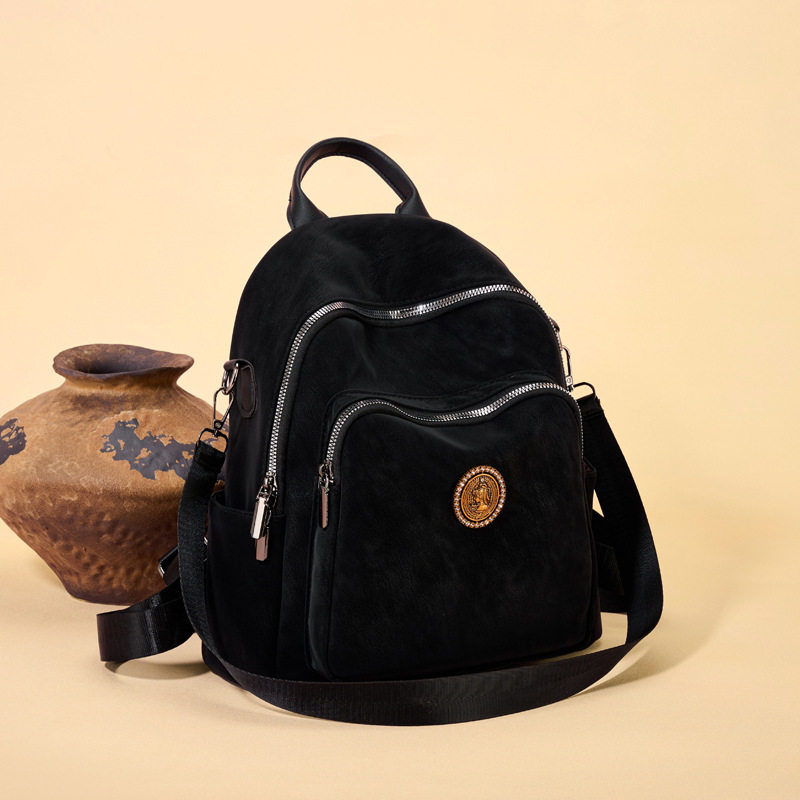 复古双肩包新款时尚简约休闲大容量书包户外旅行轻便通勤女士背包