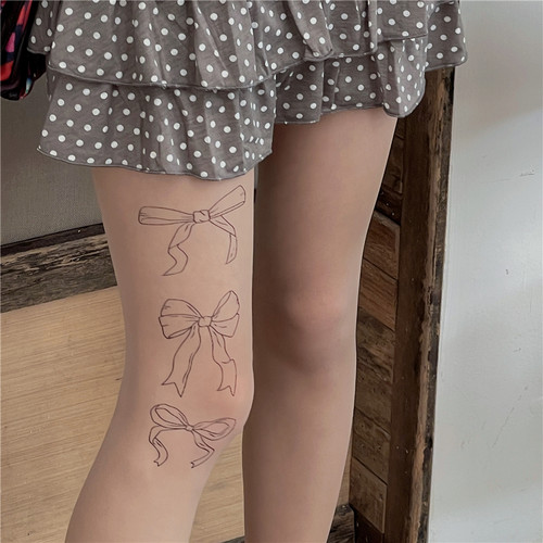 LETMESEE少女蝴蝶结印花丝袜