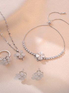 小清新四叶花白色猫眼石可旋转耳钉女幸运草项链转运戒指镶钻手链