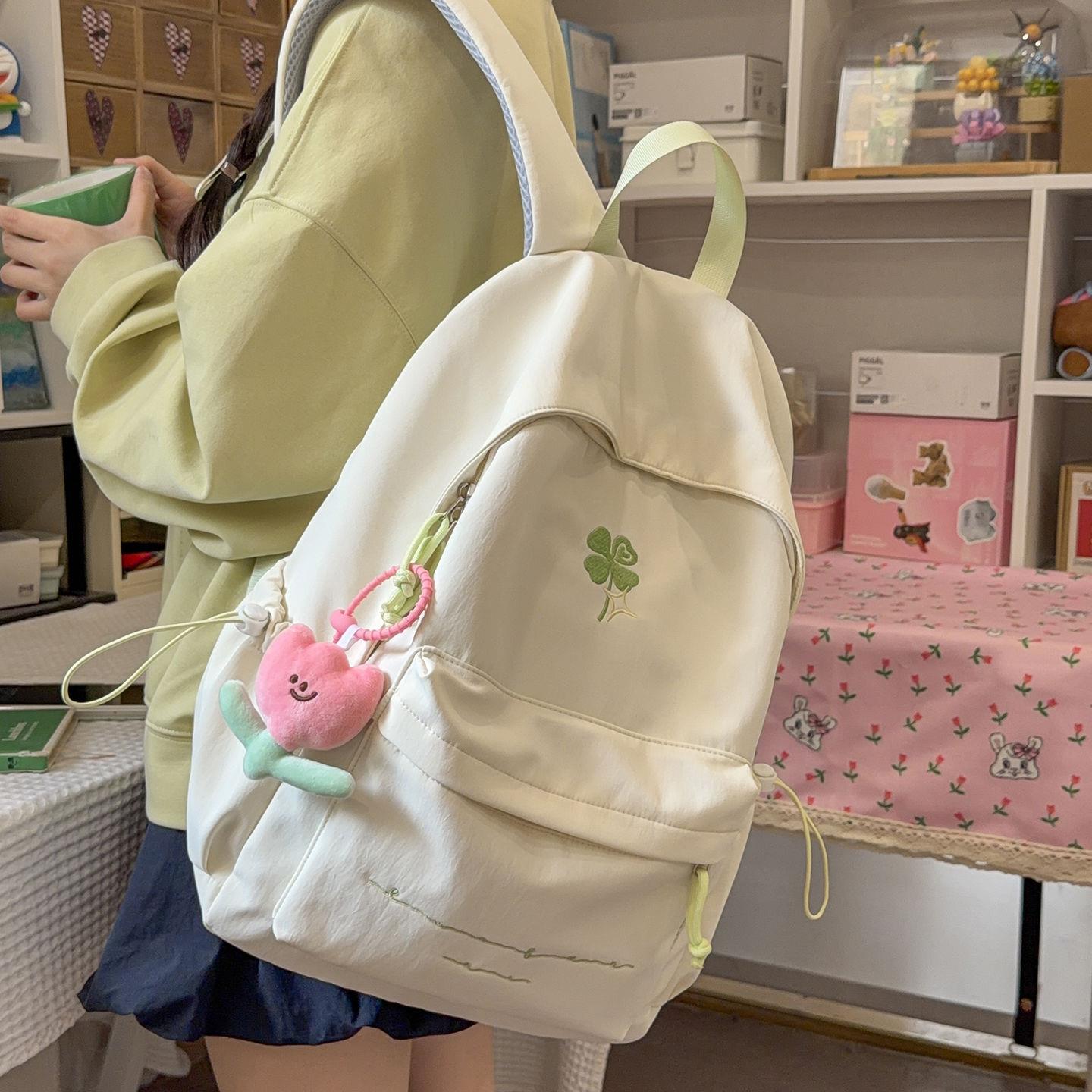 书包初中生女2026新款绿色高颜值大容量四叶草高中女生双肩包肩包