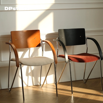 中古风家用扶手餐椅设计师复古软包单人休闲椅包豪斯不锈钢靠背椅