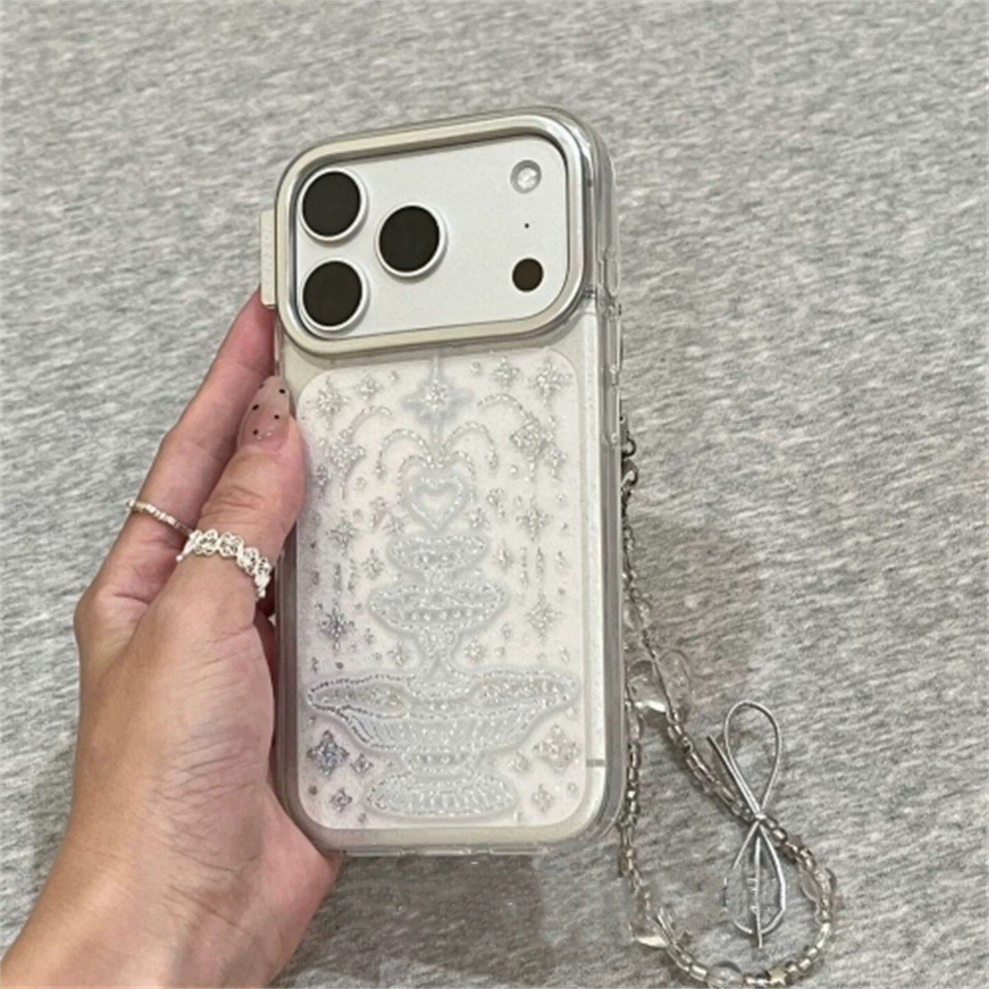 适用苹果系列iPhone17新款手机壳16promax14promax个性高级透明细闪爱心喷泉15promax半包大孔防摔网红保护套