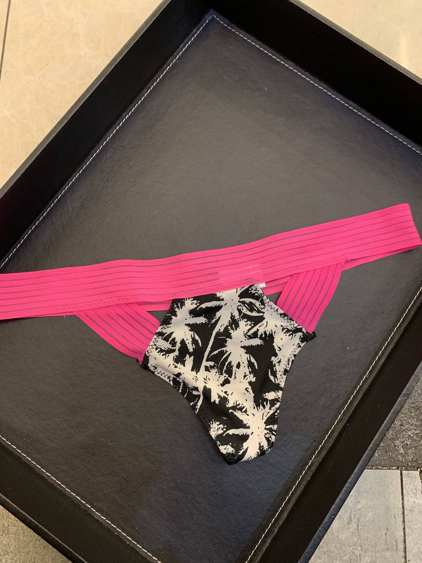 性感别致黑色玫红色丁字裤透明提臀显瘦高腰翘臀包邮69号店