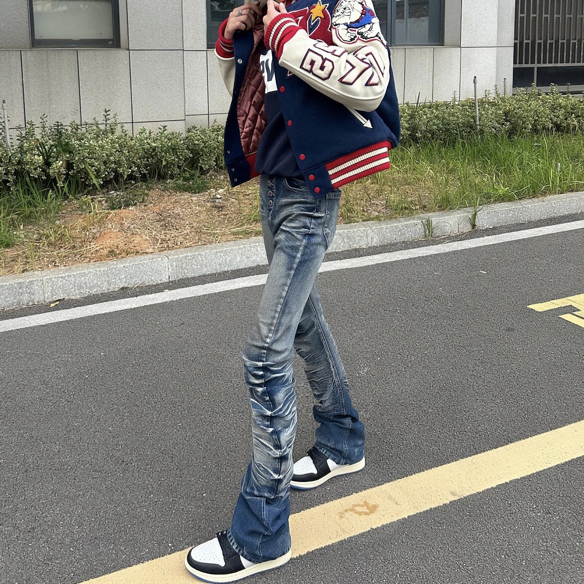 Vintage复古排扣褶皱弯刀牛仔裤图片