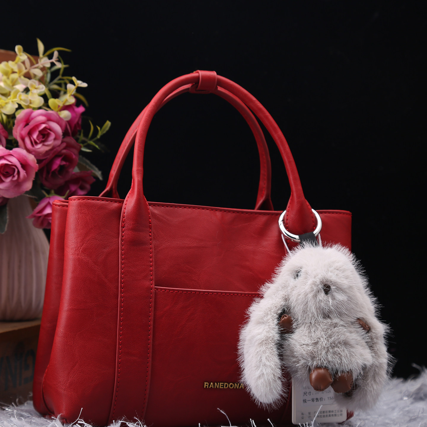 专柜正品2025新款休闲红色托特包女士轻奢小众毛绒挂件通勤单肩包