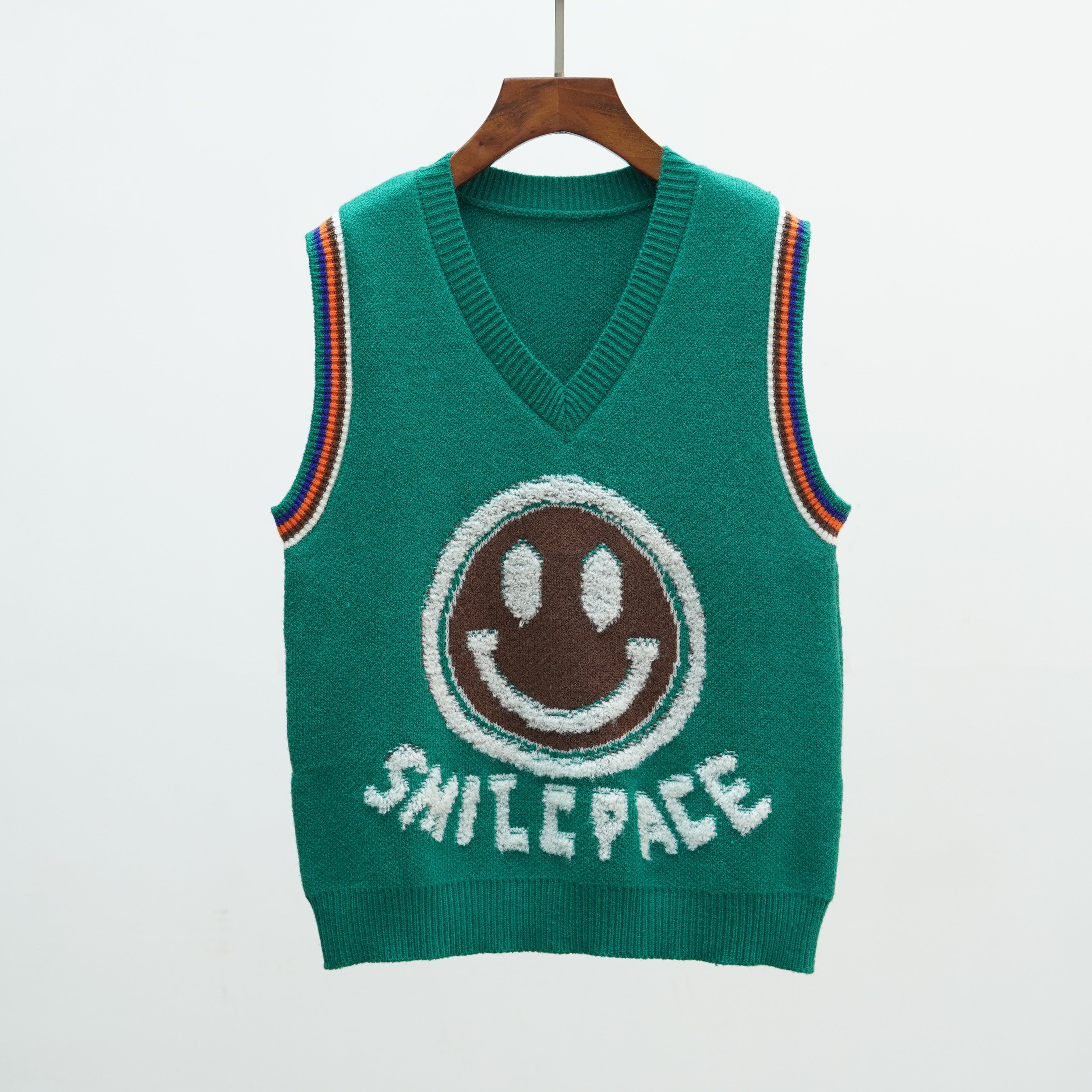 710 2025新款秋冬韩版加厚笑脸V领无袖针织马甲背心女士叠穿坎肩