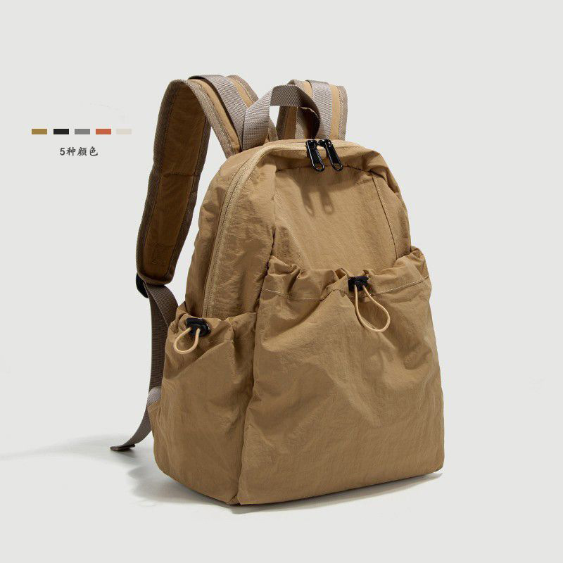 休闲轻便双肩包男女新款大容量旅游防水背包学生书包女