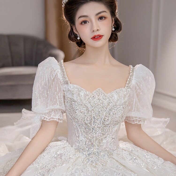 婚纱2026新款新娘主纱一字肩法式质感宫廷风拖尾夏季泡泡袖小个子