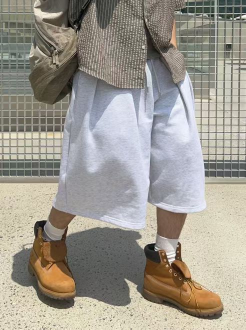 东大门男装纯色宽松过膝短裤