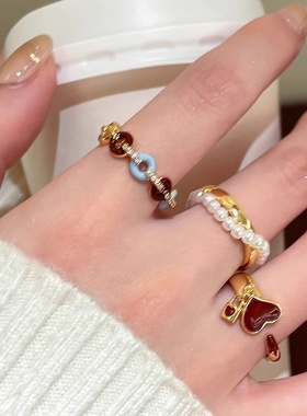 酒红色爱心珍珠戒指女小众设计开口弹力食指戒气质学生党叠戴指环