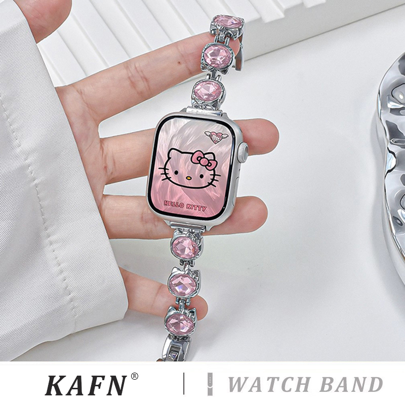 适用applewatch皓石kitty猫镶钻金属表带iWatchs9/8/7/6/se卡通粉钻手链苹果手表s10高级感小众ultra表带女夏