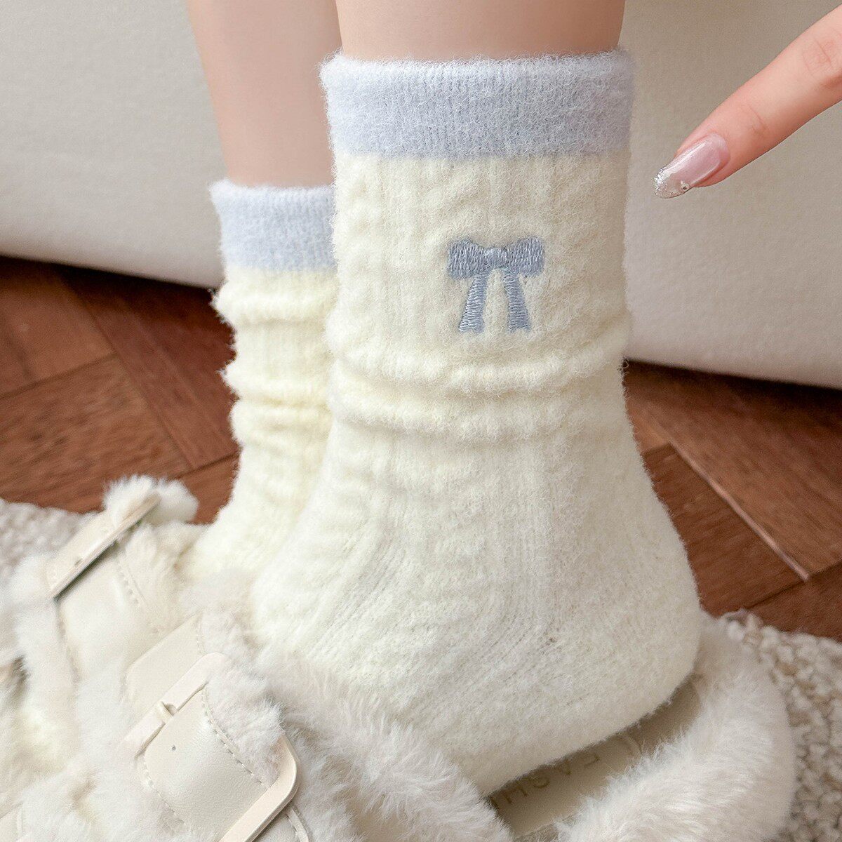 澳绒袜子女款秋冬季加厚加绒保暖中筒袜2025新款可爱蝴蝶结长筒袜